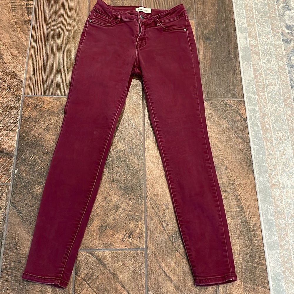 Colored jeans. Wine color